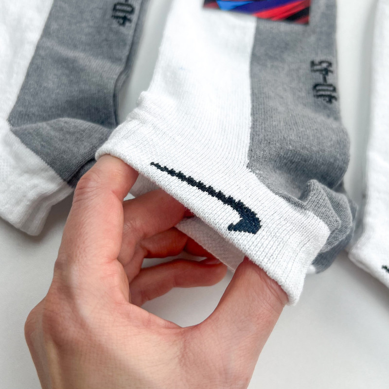 Короткі білі бавовняні шкарпетки з сірою підошвою Nike упаковка 12 пар